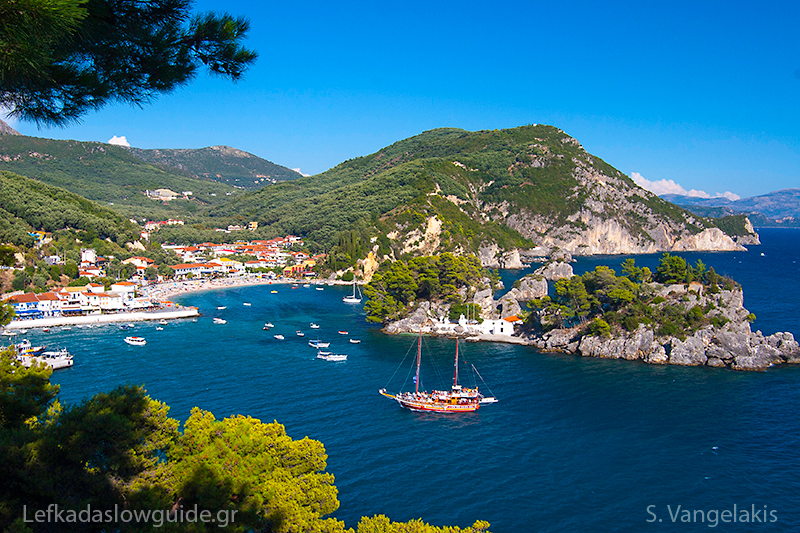 The tree-covered islet of Panagia in Parga | Lefkada Slow Guide