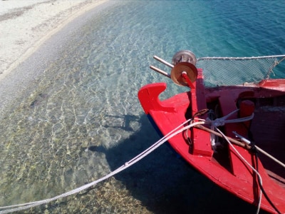 Small red boat in the sea | Lefkada island