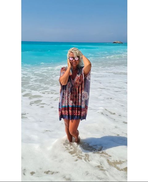 Girl posing in a beautiful beach in Lefkada island